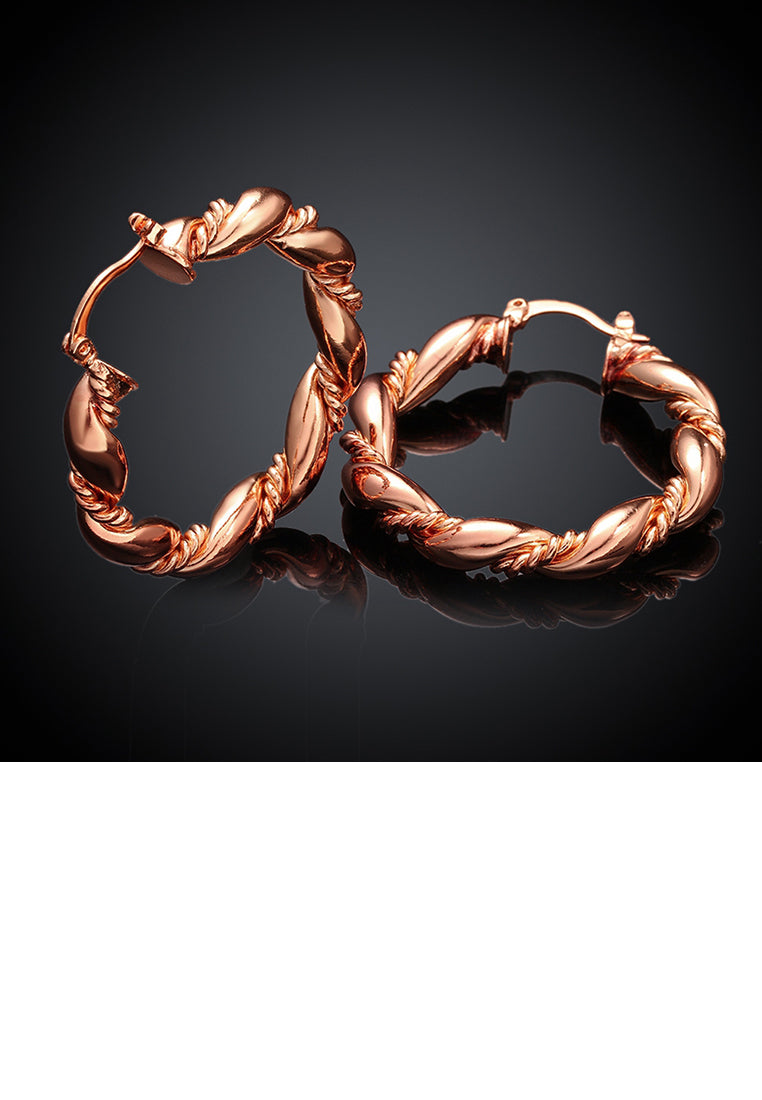 Elegant Plated Rose Gold Round Earrings